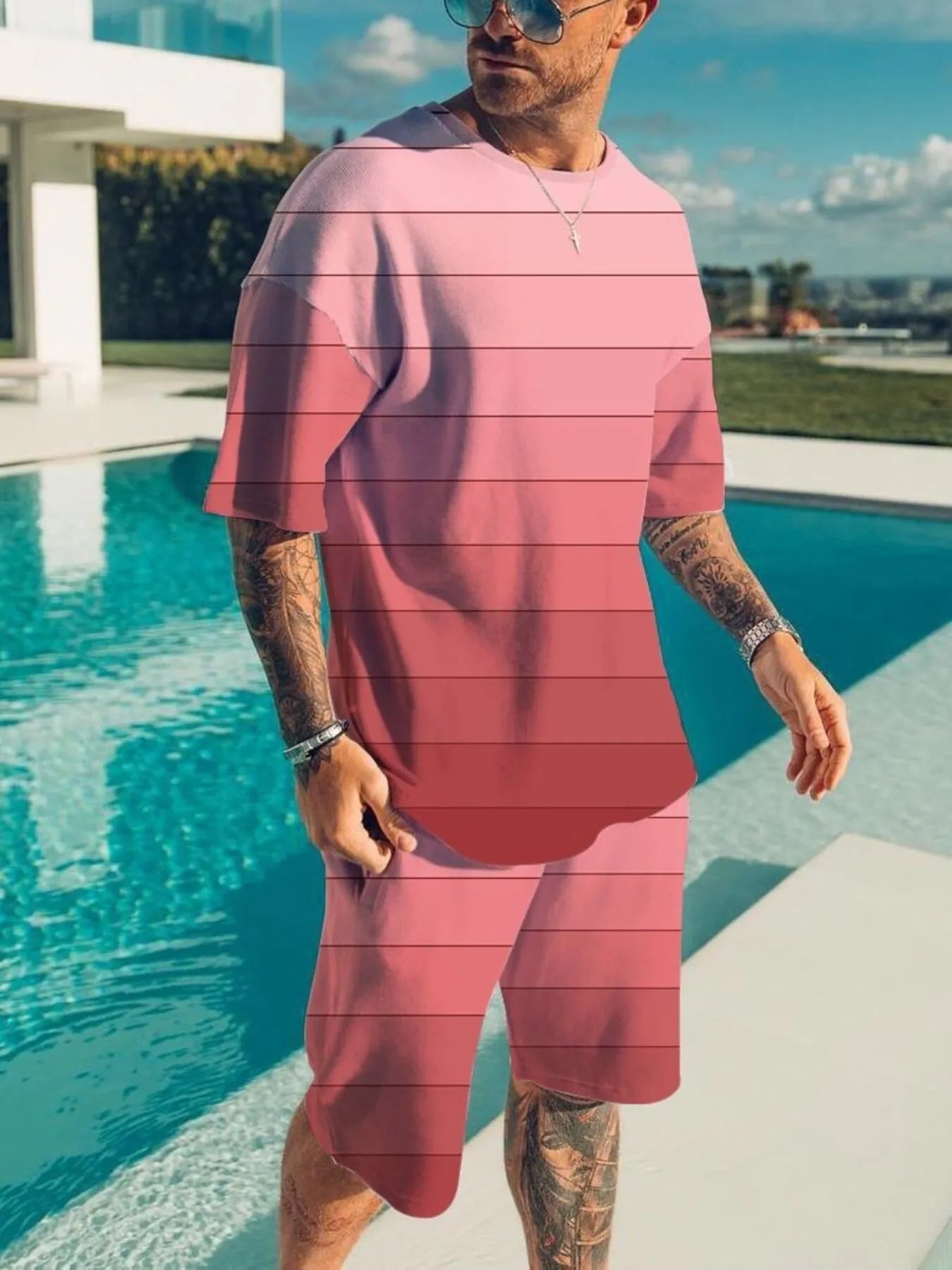Plus size men's color block tee and shorts set by Trendsi, featuring a casual, comfortable two-piece outfit for everyday wear.