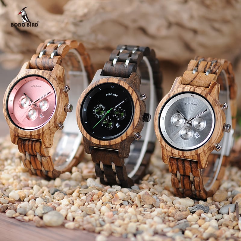 Men's wooden watch by Memories but Unique, featuring a natural wood band and round face with minimalist design.