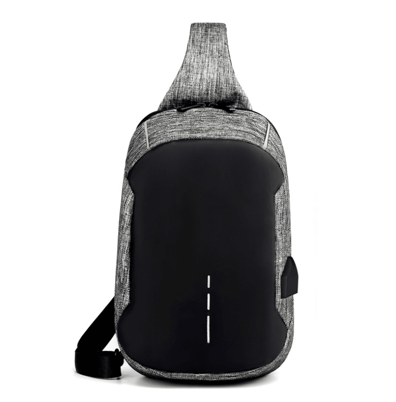 Waterproof anti-theft men's travel chest bag by Memories but Unique, shown with adjustable strap and secure zipper closure.